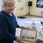 Margrit Ramel showing her painting